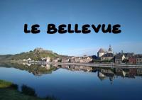 a view of a river with a city and the words he believe at Le Bellevue in Givet