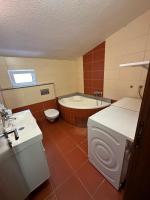 Kúpeľňa v ubytovaní Apartment Pupina