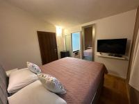 Posteľ alebo postele v izbe v ubytovaní Apartment Pupina