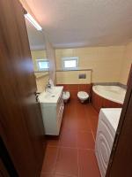 Kúpeľňa v ubytovaní Apartment Pupina