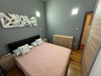 Posteľ alebo postele v izbe v ubytovaní Apartment Pupina