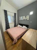 Posteľ alebo postele v izbe v ubytovaní Apartment Pupina