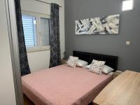 Posteľ alebo postele v izbe v ubytovaní Apartment Pupina