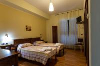 Posteľ alebo postele v izbe v ubytovaní Hotel Pina Ristorante