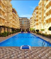 Bazén v ubytování Sunny studio with 3 swimming pools Florenza Hurghada nebo v jeho okolí