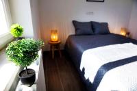 Un pat sau paturi &icirc;ntr-o camer&#x103; la Jolie T2 lumineux bien plac&eacute; avec terrasse - stationnement gratuit - wifi