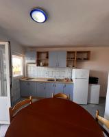 Kuchyň nebo kuchyňský kout v ubytování Apartmani Leila