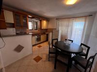 Kuchyň nebo kuchyňský kout v ubytování Apartmani Leila