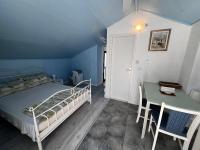 Postel nebo postele na pokoji v ubytování Apartmani Leila