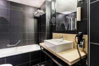 Een badkamer bij NH Amsterdam Noord