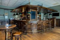 De lounge of bar bij NH Amsterdam Noord