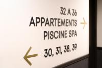 a sign that says experiments and pressure spa at Hôtel Mar I Cel &amp; Spa in Canet-en-Roussillon