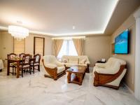 Posezení v ubytování Paradise Center Premium Suite 1