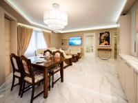 Posezení v ubytování Paradise Center Premium Suite 1