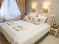 Postel nebo postele na pokoji v ubytování Paradise Center Premium Suite 1