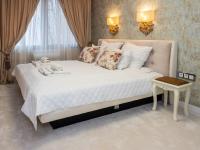 Postel nebo postele na pokoji v ubytování Paradise Center Premium Suite 1