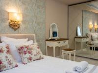 Postel nebo postele na pokoji v ubytování Paradise Center Premium Suite 1