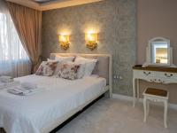 Postel nebo postele na pokoji v ubytování Paradise Center Premium Suite 1