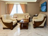 Posezení v ubytování Paradise Center Premium Suite 1