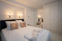 Postel nebo postele na pokoji v ubytování Paradise Center Premium Suite 2