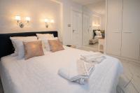 Postel nebo postele na pokoji v ubytování Paradise Center Premium Suite 2