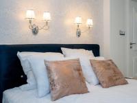 Postel nebo postele na pokoji v ubytování Paradise Center Premium Suite 2