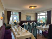 Khu vực ghế ngồi tại Hotel & Apartments Leugermann