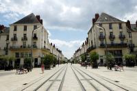 an empty street in a city with buildings at HALTE 3 &#47; GUÈS DE VEIGNE in Veigné