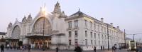 a large building with people walking in front of it at HALTE 3 &#47; GUÈS DE VEIGNE in Veigné