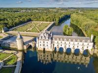 an aerial view of a castle on a river at HALTE 3 &#47; GUÈS DE VEIGNE in Veigné