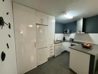 A kitchen or kitchenette at APARTAMENTO ROMELIA bajo A