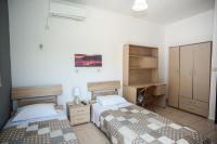 Posteľ alebo postele v izbe v ubytovaní Gravanis IR Home
