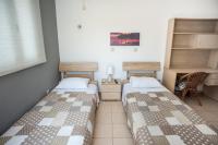 Posteľ alebo postele v izbe v ubytovaní Gravanis IR Home