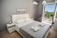 Posteľ alebo postele v izbe v ubytovaní Gravanis IR Home