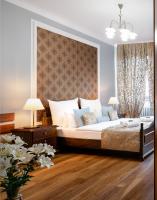 Łóżko lub łóżka w pokoju w obiekcie Baron Boutique Hotel