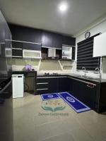 Zayyan Guesthouseにあるキッチンまたは簡易キッチン