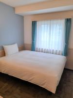 Toyoko Inn Changwonにあるベッド