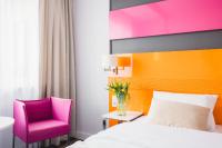 Posteľ alebo postele v izbe v ubytovaní METROPOL Hotel Katowice