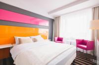 Posteľ alebo postele v izbe v ubytovaní METROPOL Hotel Katowice