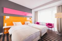 Posteľ alebo postele v izbe v ubytovaní METROPOL Hotel Katowice