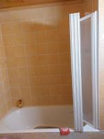 a bathroom with a shower and a bath tub at Les Airelles 33, Le coin, Molines en Queyras Classé 3 étoiles in Molines-en-Queyras