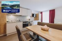 Kuchnia lub aneks kuchenny w obiekcie Appartements Sulzer by we rent, SUMMERCARD INCLUDED