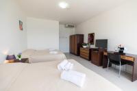 Posteľ alebo postele v izbe v ubytovaní Hotel De Plam