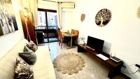 TV a/nebo společenská místnost v ubytování Bohemio Playa Los Cristianos By Deihu Experiecias