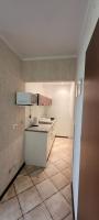 Kuchyňa alebo kuchynka v ubytovaní Apartament Ogrody