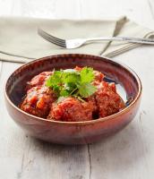 un tazón de comida en una mesa con un tenedor en Hotel Temse, en Temse