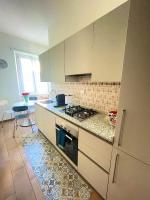 Kuchyňa alebo kuchynka v ubytovaní Lucens Domus Appartamento Roma quartiere Trieste - vicino Metro b1 -