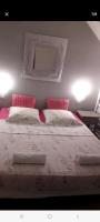 Una cama o camas en una habitaci&oacute;n de Duplex bord de mer