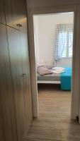 Posteľ alebo postele v izbe v ubytovaní Angela's Luxury Apartments