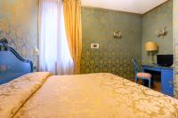 Postel nebo postele na pokoji v ubytování Residenza Ca' San Marco
